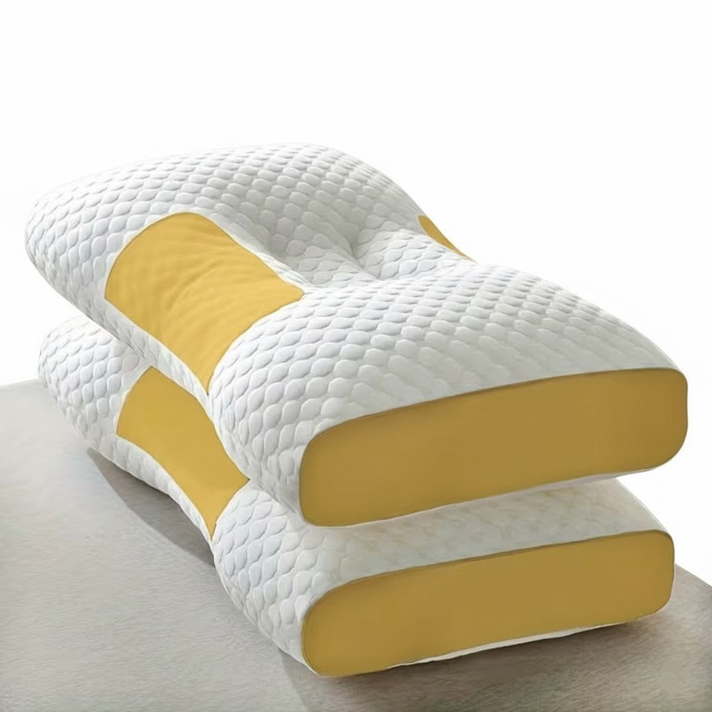Ergonomic pillow with white quilted surface and yellow accents on a light gray background